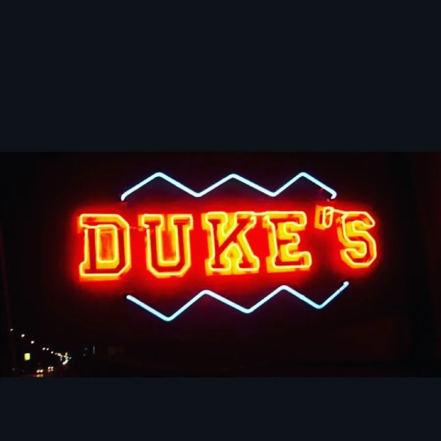 Duke's iconic red and blue neon sign